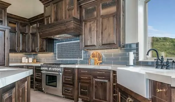 13938 farmhouse vases above cabinets